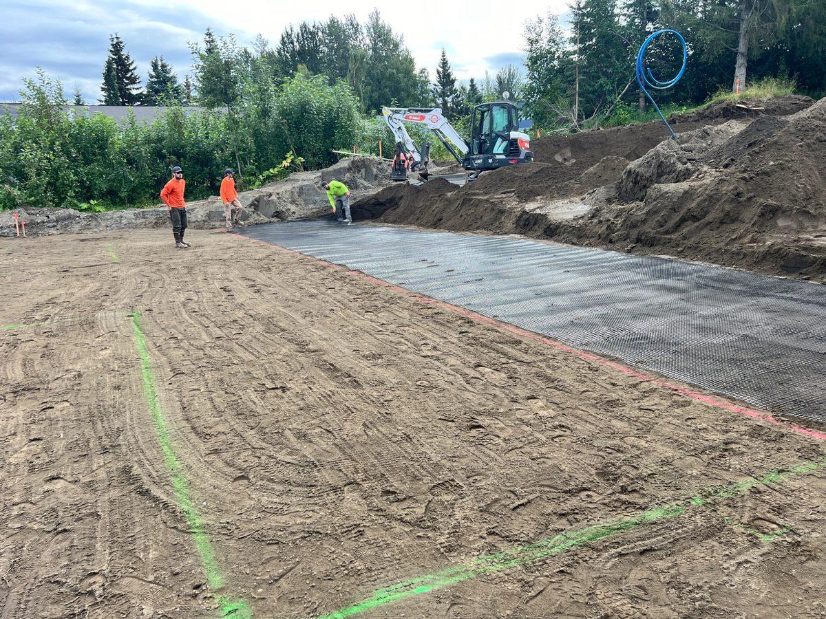 BTH Construction crew working on a drainfield installation in Anchorage, Alaska