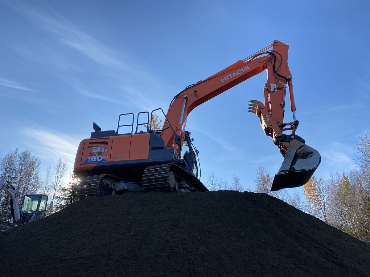 BTH Construction Hitachi ZAXIS 160LC on excavation site with fall foliage, Anchorage Alaska